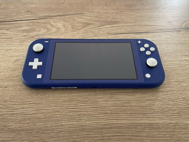 Console Nintendo Switch lite (avec carton d’emballage)