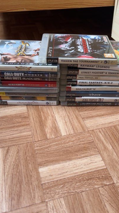 PS3 avec 17 jeux 4 manette