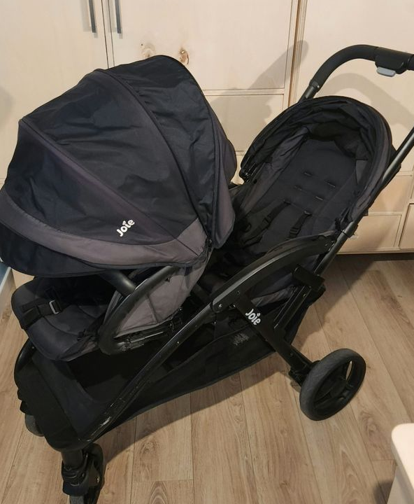 Poussette double joie evalite