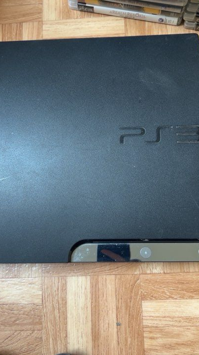 PS3 avec 17 jeux 4 manette