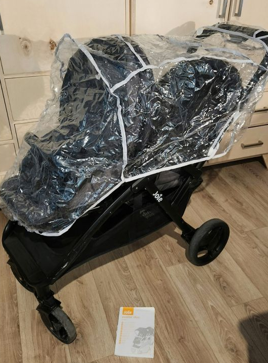 Poussette double joie evalite