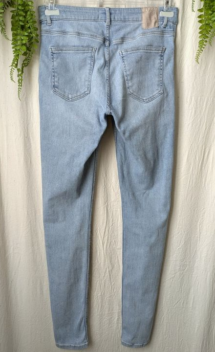 Jean taille haute skinny moulant extensible bleu clair délavé 