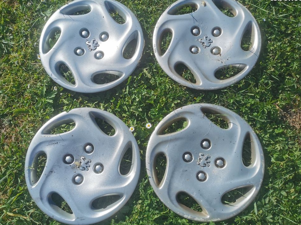 4 enjoliveurs Peugeot 14 pouce modèle Florida